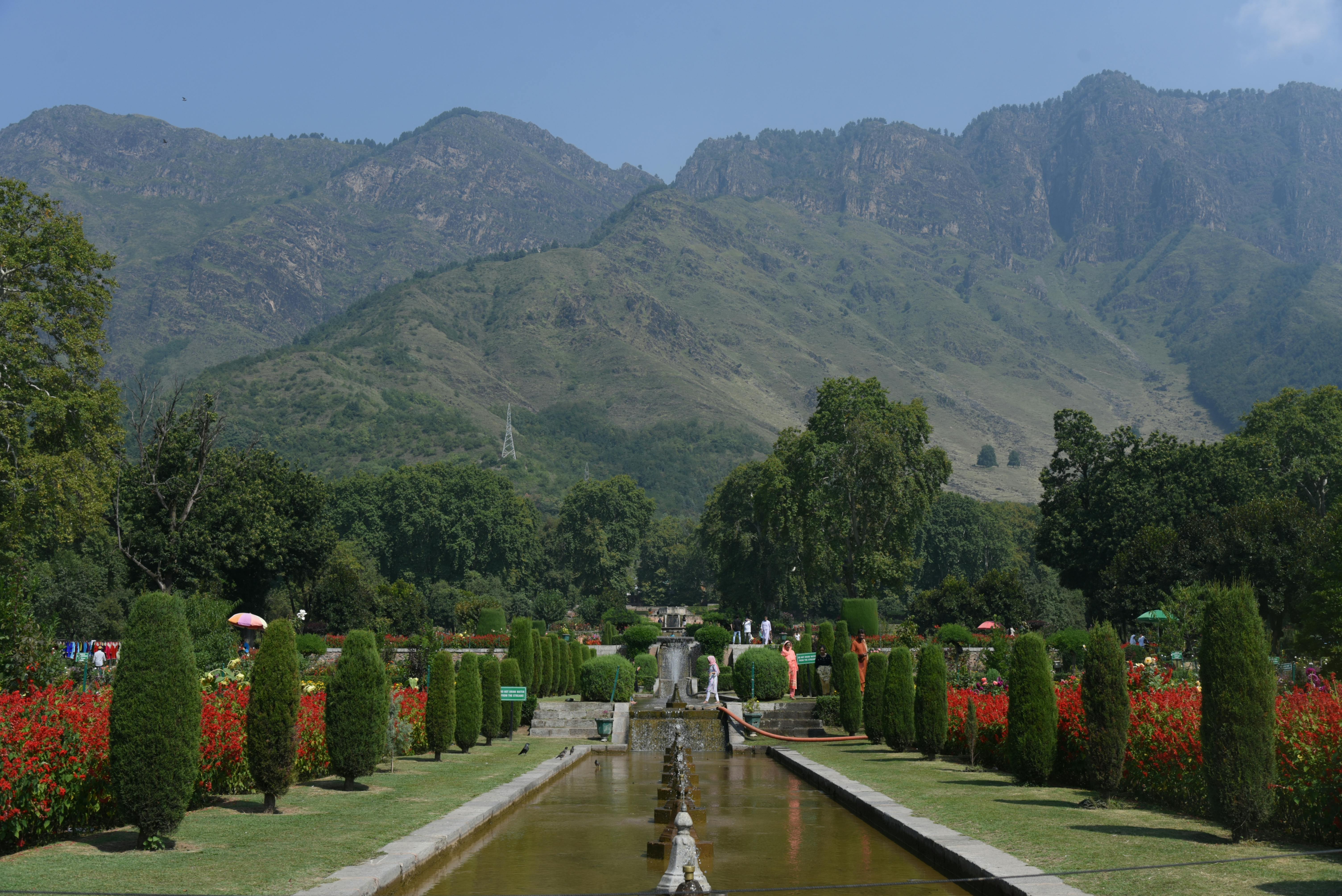 1924377264.free-photo-of-scenic-garden-below-the-kashmir-mountains.jpeg